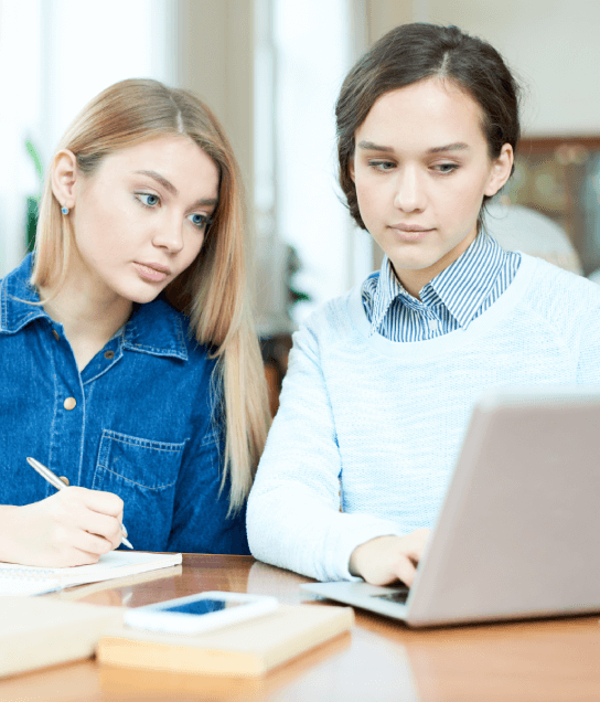 Students using guidelines translated through Lexington Translation Services for global research collaboration.