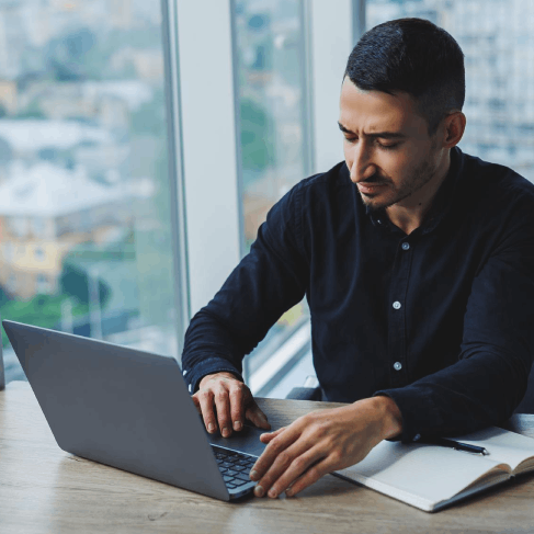 A legal translator reviews a sworn affidavit and exhibits, and Asylum Translation Services format pages for USCIS.