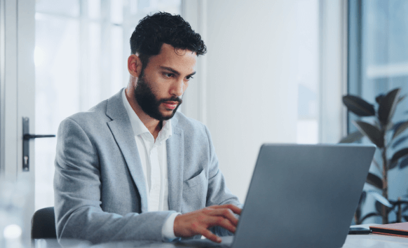 The professional translator works on the Ames translation service, ensuring accurate communication for clients.