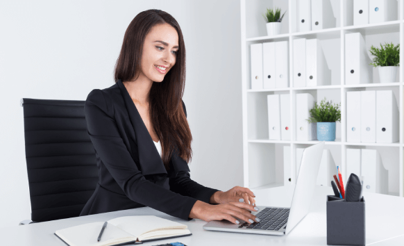 A translator using Appliance translation services to convert technical manuals accurately for international users.