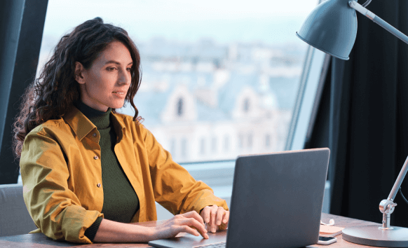 Professional typing on a laptop, emphasizing professional automotive translation services for precise documentation. Professional typing on a laptop, emphasizing professional automotive translation services for precise documentation.