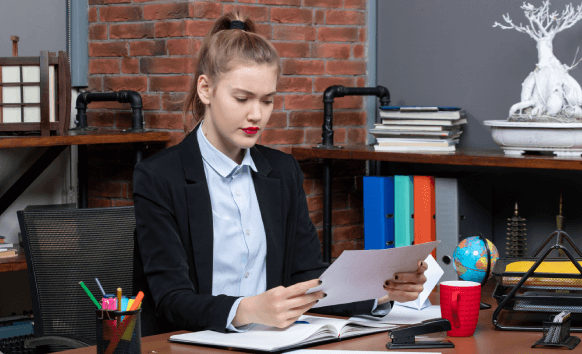 A translator working on a financial document, ensuring accurate translation for bank statements worldwide.