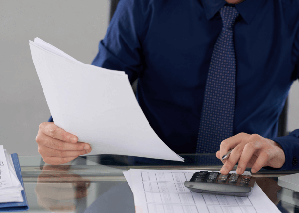 Our expert translator reviews financial documents highlights the nature of banking translation services, ensuring precision