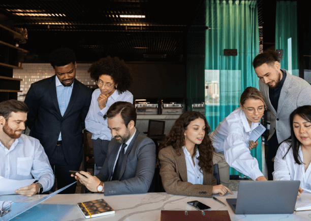 A diverse team collaborates on banking translations, ensuring culturally sensitive international mergers and acquisitions.