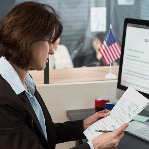 A translator reviews the source file for post-delivery support revisions at Battle Ground Translation Services to meet court.