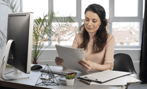 A linguist checks brand voice notes against a custom glossary while White Papers Translation Services refines key terms.