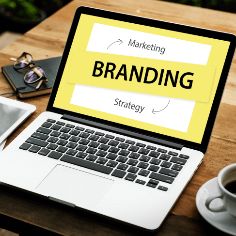 A marketing translator works on brochure translation to ensure brand consistency across various international markets.