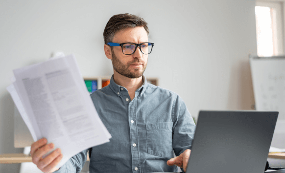 Certified translator working on important documents in Newark, ensuring accurate translations for official use.