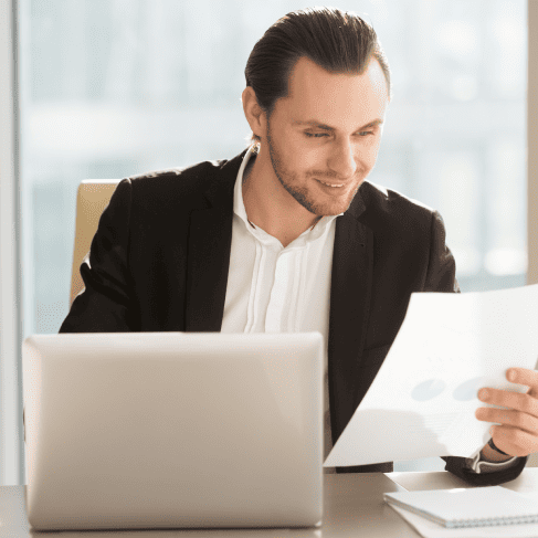 Man working on laptop, highlighting expert translation solutions tailored for industry-specific needs in Las Vegas.