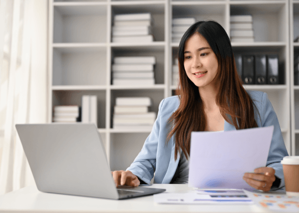 A translator reads a lease margin note and types the meaning, delivering certified Lease Document Translation Services.