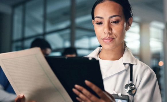 A regulatory associate prepares a certified FDA filing packet with Life Science Translation Services for regulated documents.