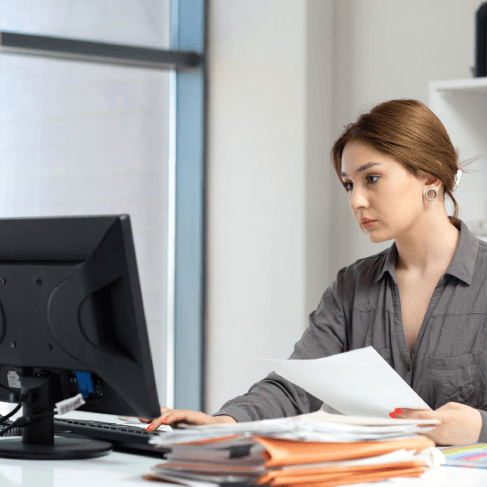 Certified translator working on official documents using philadelphia-translation-services.