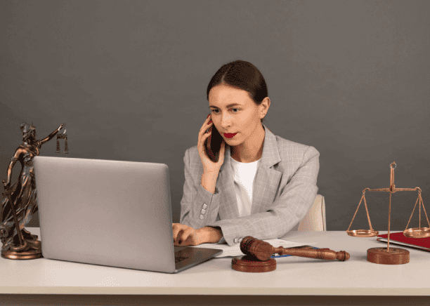 Lawyer verifing the document with justice scales that translated from legal translation services for Charlotte law firms.