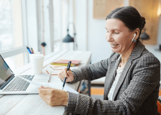 An experienced Spanish linguist in the process of translating  a document into Spanish. An experienced Spanish linguist in the process of translating  a document into Spanish.