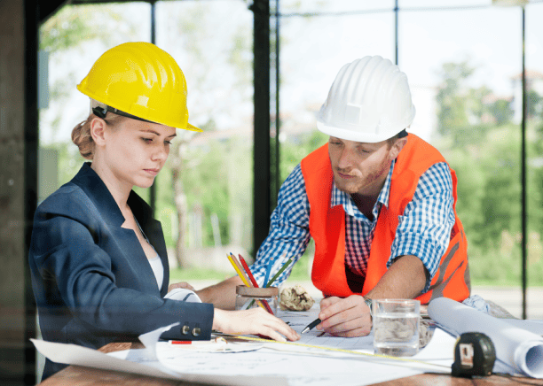 Engineers collaborating at a translators on laptop, emphasizing accurate translations for civil engineering documents. Engineers collaborating at a translators on laptop, emphasizing accurate translations for civil engineering documents.