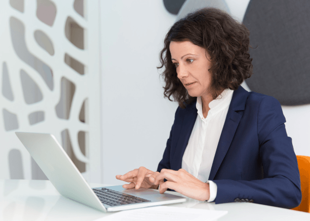 A sales rep compares original and translated contact details after Business Card Translation Services for companies.