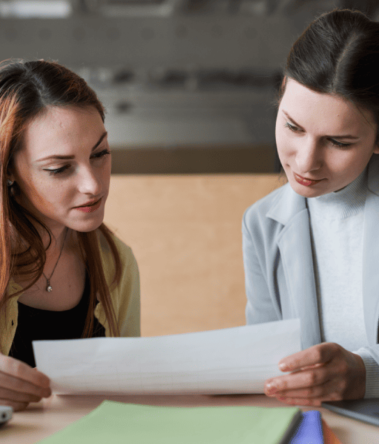 Translators delivering compliance translation services for HR handbooks, onboarding, and employee termination documents.