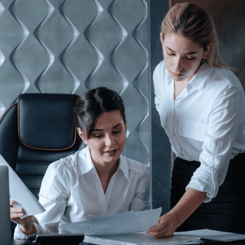 Translators working on compliance translation services for corporate governance and regulatory documentation success.