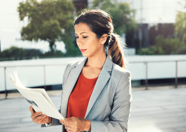 Dallas resident confidently using accurately translated legal papers, made possible by trusted Dallas translation services.