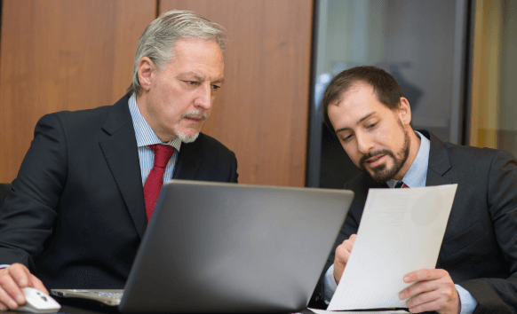 Translators working on different types of documents for investor relations translation service with accuracy. Translators working on different types of documents for investor relations translation service with accuracy.