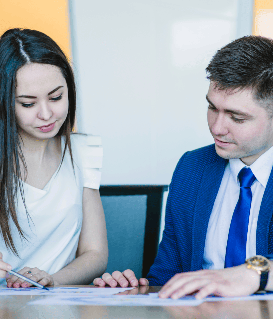 A translators working on annual reports and corporate policies using corporate translation services. A translators working on annual reports and corporate policies using corporate translation services.