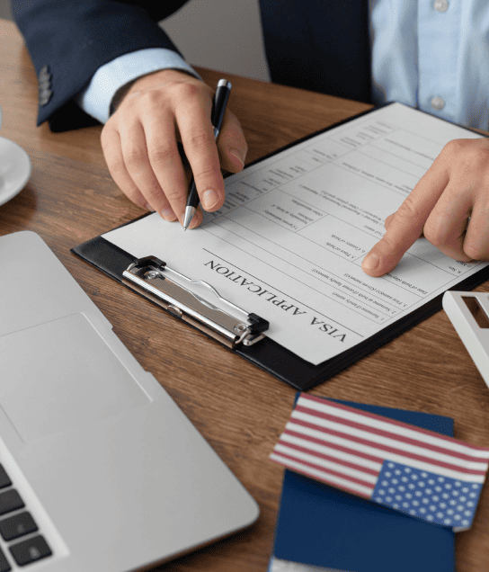 A translator working on certified family documents ensuring accuracy and compliance with USCIS and ISO standards.