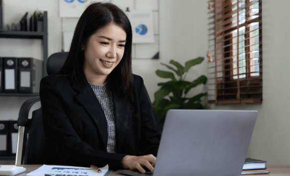 Professional translator working at a trusted Financial Translation Service company delivering precise corporate translations.