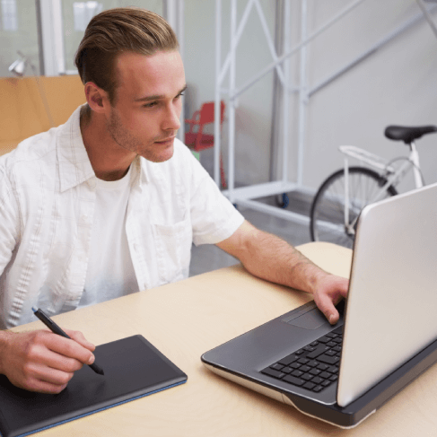 Translator works on german translation services for brochures, branding, and business proposal success. Translator works on german translation services for brochures, branding, and business proposal success.