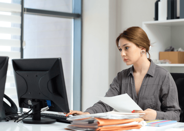 A linguist updates an HVAC term glossary for Appliance translation services, cross-checking SEER ratings and fault codes.