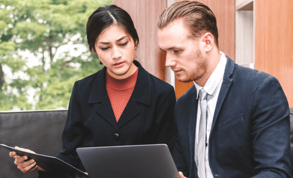 A professional translator helping with employee handbook translation, improving workforce productivity.