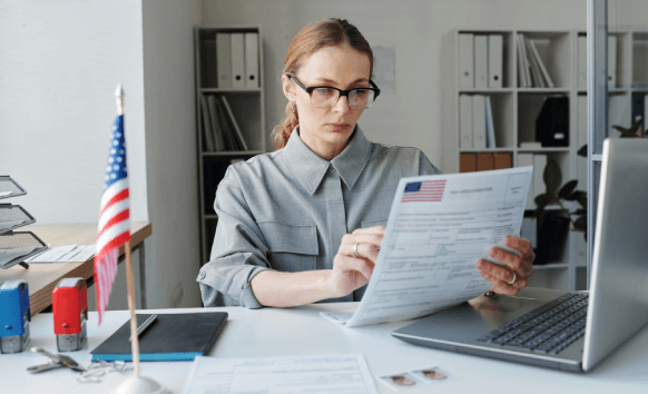 Customer reviewing translated HR policies and procedures handbook, offering clarity through accurate translation.