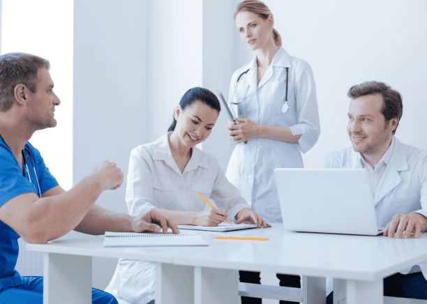 Energetic doctors collaborating with translators, highlighting accurate healthcare translations for global medical practices.