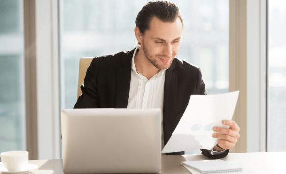 A translator updates a heavy equipment manual in CAT software using Heavy Equipment Translation Services.