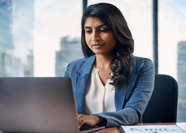 An HR manager reviews an employee pulse draft as Survey Translation Services align industry terms across languages.