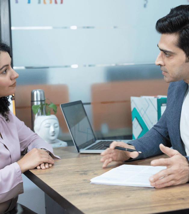 A translator explains the importance of certified translation services to a client, in police investigations. A translator explains the importance of certified translation services to a client, in police investigations.