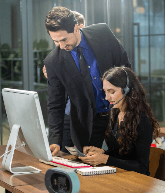 A woman working on the laptop, representing industry-specific translation services tailored to unique business requirements. A woman working on the laptop, representing industry-specific translation services tailored to unique business requirements.