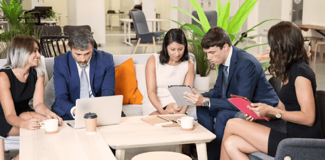 Diverse team of industry translators working together in Atlanta office for accuracy and security.