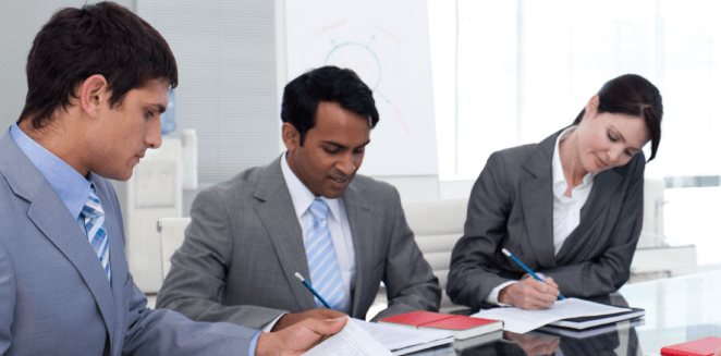A diverse group of translators working together on industry-related documents in San Francisco. A diverse group of translators working together on industry-related documents in San Francisco.