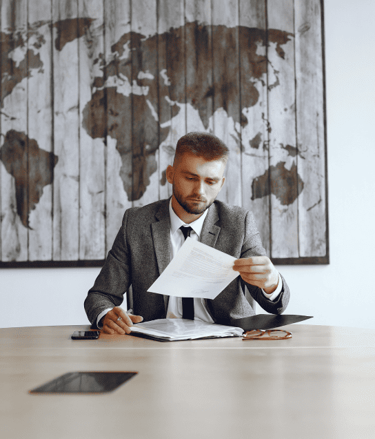 A translator reviews document to focusing on international document translations to seamless global communication. A translator reviews document to focusing on international document translations to seamless global communication.