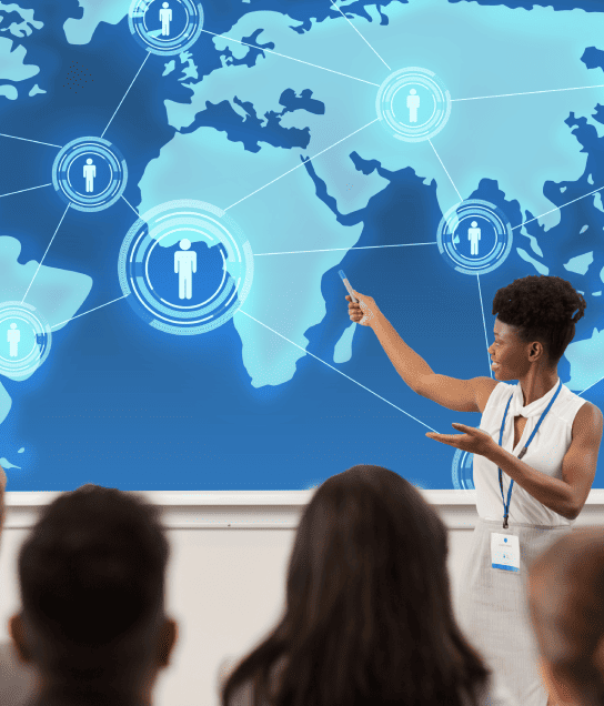 A woman presenting to an international users, showing how life science translation services help reach clients worldwide.