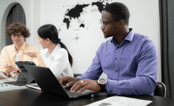 A team of translaotrs collaborating, demonstrating life science translation services are tailored to specific industry needs.