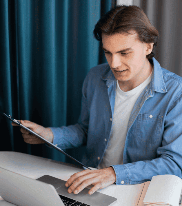 Hands typing on a laptop with translate across various languages for the expertise of multilingual life science translators.