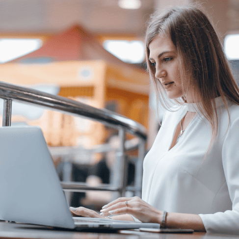 Expert working carefully on Los Angeles translation services, ensuring culturally relevant marketing communication globally.