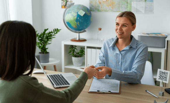 Professional working on a laptop, ensuring affordable and accurate passport translation services.