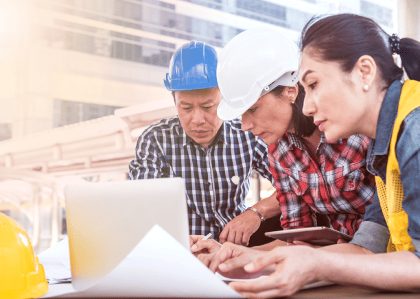 Team of engineers discussing with translator for high-quality mechanical engineering document translation services. Team of engineers discussing with translator for high-quality mechanical engineering document translation services.