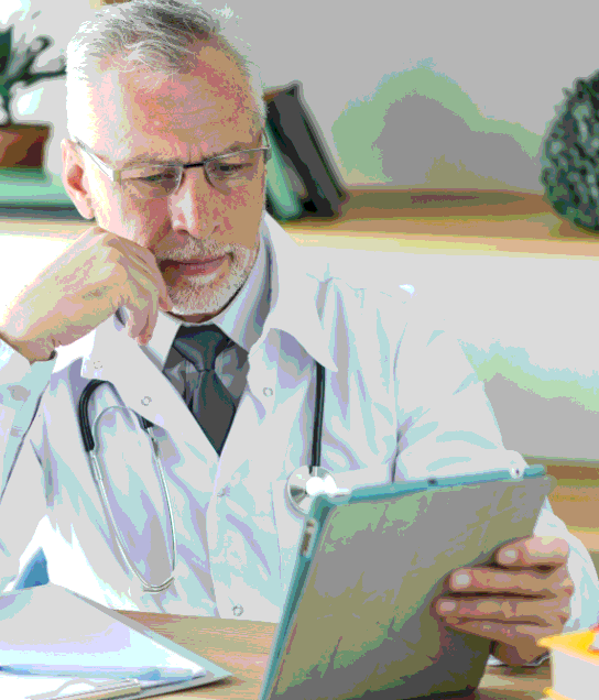 A clinician checks a translated consent form as Enterprise Translation Services keeps medical wording clear for patients.