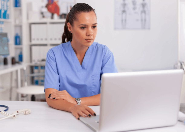 Nurse reviews a discharge summary as Salt Lake City Translation Services provides medical terminology checks for care.