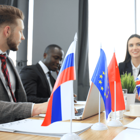 Diverse group of translators at an international for the role of multilingual medical translations in precise communication.