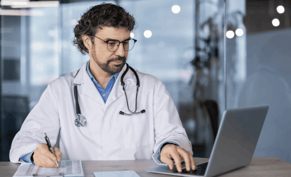 A focused doctor verifing the documents, representing medical translation services in Calgary in healthcare.