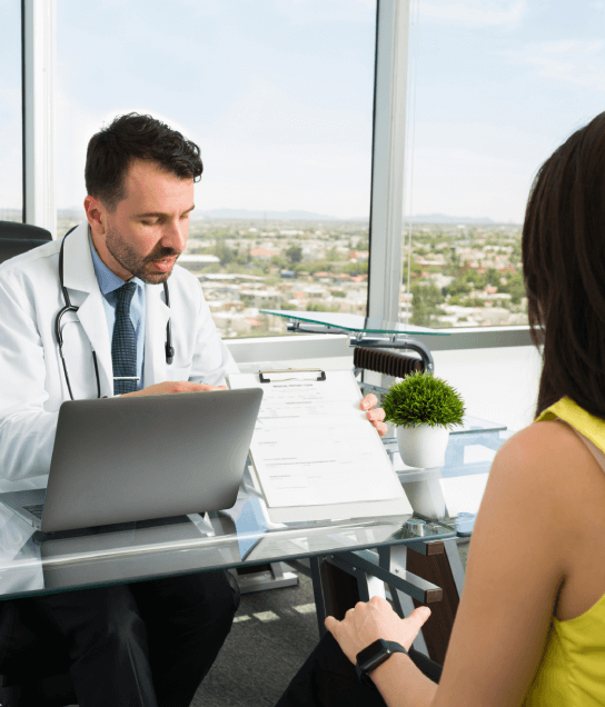 Doctors discuss with translator for specialized medical translation services in Houston for healthcare communication.